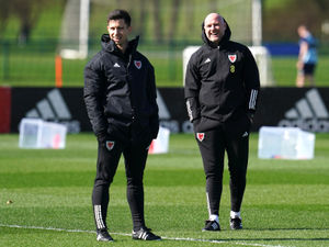 Eric Ramsay leading a Wales training session with head coach Rob Page in March 2023. Pic: PA