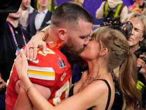 Supporting image for story: Taylor Swift and Travis Kelce seal Super Bowl victory with a kiss