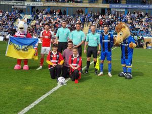 Supporting image for story: Ukrainian refugee leads Gillingham on to pitch just days after arriving in UK