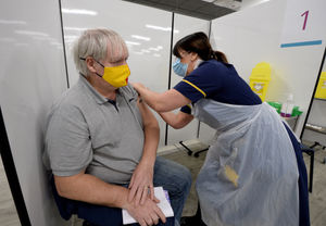 Neil Smith, from East Park, Wolverhampton, is the first person to have the vaccination at the new centre