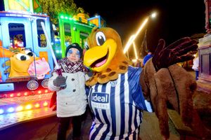 West Bromwich Albion's mascot poses with five-year-old Tomass Balodis