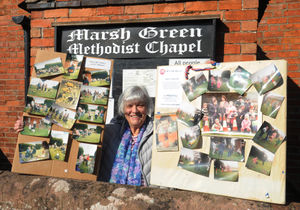 Chapel steward Alison Evans with display boards of Sunday School events