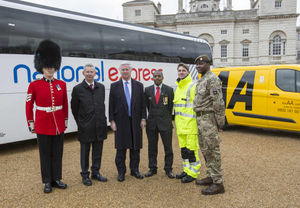 The Defence Secretary Michael Fallon presents gold awards to the winners of the Armed Forces Covenant Employer Recognition Scheme