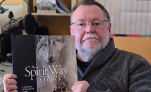 Dr Paul Darke of Wolverhampton's Wolves in Wolves with Copy of the new book.