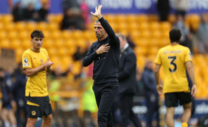 Gary O'Neil apologies to the home fans after Wolves' 6-2 defeat to Chelsea (Photo by David Rogers/Getty Images)