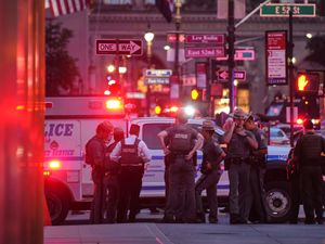 Supporting image for story: Four killed by gunman in Manhattan office tower block