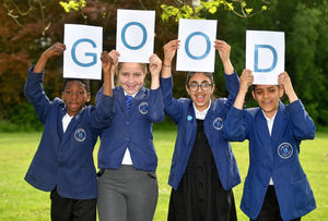Willenhall's Lodge Farm Primary School pupils Gurnoor Singh, Taranjot Kaur, Arleta Narutyte and Frederick Ogidan celebrate its 'good' Ofsted rating
