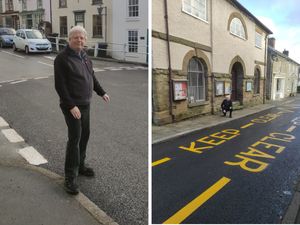 Councillor Hartin at the newly resurfaced road.