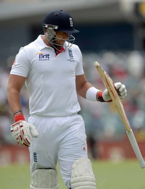 England's Tim Bresnan reacts after losing his wicket