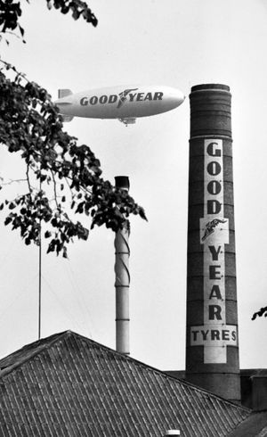  The Goodyear airship by a Goodyear Tyres chimney