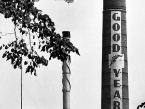  The Goodyear airship by a Goodyear Tyres chimney