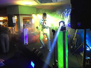 Andy appearing on stage as Elvis Presley