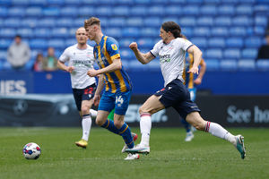 Rob Street of Shrewsbury Town and MJ Williams of Bolton Wanderers (AMA)
