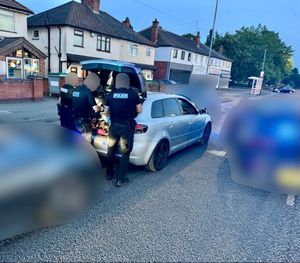 Officers with the car