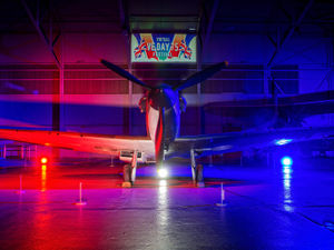 Supporting image for story: RAF Cosford Spitfire lit up to mark VE Day anniversary