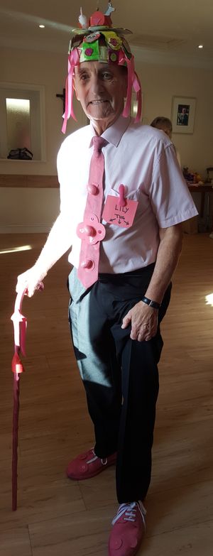 John made his seasonal hat and dyed his tie and shoes.