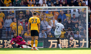 Brentford's Ivan Toney scores the opening goal of the game