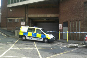Police corden off a loading bay at Churchhill shopping centre in Dudley after the tragedy