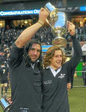 Oxford Captain John Carter, left and Sam Egerton celebrate victory