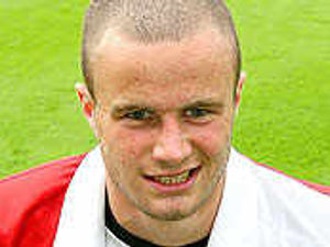 Supporting image for story: Baker's time to rise for Harriers