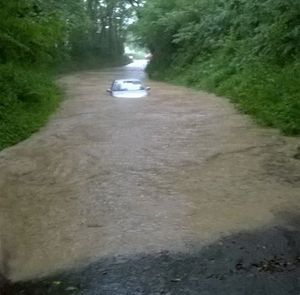 This car got stranded on a rural road in Harton near Church Stretton. Photo: Tom Orme