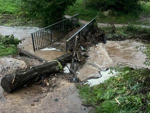 Supporting image for story: Storm Babet uproots trees and wrecks Wombourne bridge 