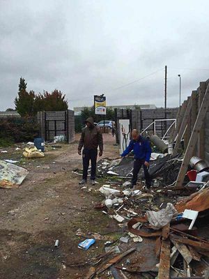 Boss Ian Rowe, right, prepares to get his hands dirty