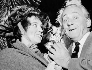 Entertainer Hughie Green at his Christmas show at the Granada theatre, Shrewsbury, in December 1968. The caption reads: 'Heather Game, of Meole Crescent, Shrewsbury, playing Eliza Doolittle from My Fair Lady, presents Hughie Green with a rose during a performance of Hughie's 'Opportunity Knocks' show at the Granada, Shrewsbury.'