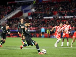 Mohamed Salah sidefoots a penalty with his left foot