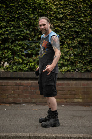 Music fan Chris Grenier arrives to attend British rock band Black Sabbath's "Back to The Beginning" concert, Ozzy Osbourne's final ever gig as Black Sabbath's frontman at Villa Park in Birmingham, central England on July 5, 2025. Osbourne, who revealed in 2020 that he has Parkinson's disease, will join Tony Iommi, Geezer Butler and Bill Ward for the all-day "Back To The Beginning" show in Birmingham, central England, where the heavy metal giants formed in 1968. (Photo by Oli SCARFF / AFP) (Photo by OLI SCARFF/AFP via Getty Images)          