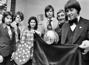 'There's more to magic than pulling rabbits out of a hat and David Oakley proved this when he won a competition for young members of Wolverhampton Circle of Magicians. David, aged 18, of Stafford, is pictured showing the other competitors a sample of the act which won him the William Stevens Shield last night. David has only been a member of the circle for about six months but already has several specialities including the Chinese linking-rings trick. Also pictured, from left, are: Tony Salmon, of Wolverhampton; Mark Fletcher, of Sedgley; Linda Blount, of Coven; Leigh Stanley, of Cannock; and Lawson Siviter, of Kingswinford.\