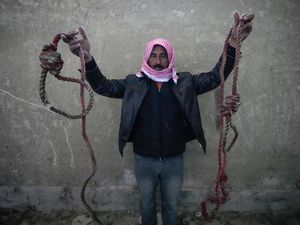 Supporting image for story: Thousands flock to Assad regime prison in search for missing loved ones