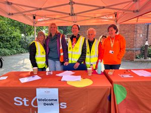 Volunteers on check in desk