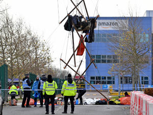 Supporting image for story: Extinction Rebellion protesters arrested after blockading Amazon Rugeley