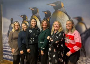 Peakes Travel Elite managing director Claire Moore (third right) with the team in the agency's new-look showroom in Shrewsbury
