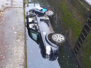 Supporting image for story: Black Country canal lock is closed off after car falls in