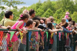 Children watch the event's duck race last year.