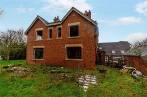 Thepart built extension at the property which agents say can be used as a kitchen or living accommodation