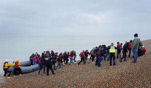 Migrants arriving at a beach in Dungeness, Kent, last week. [Photo credit: Gareth Fuller/PA Wire]
