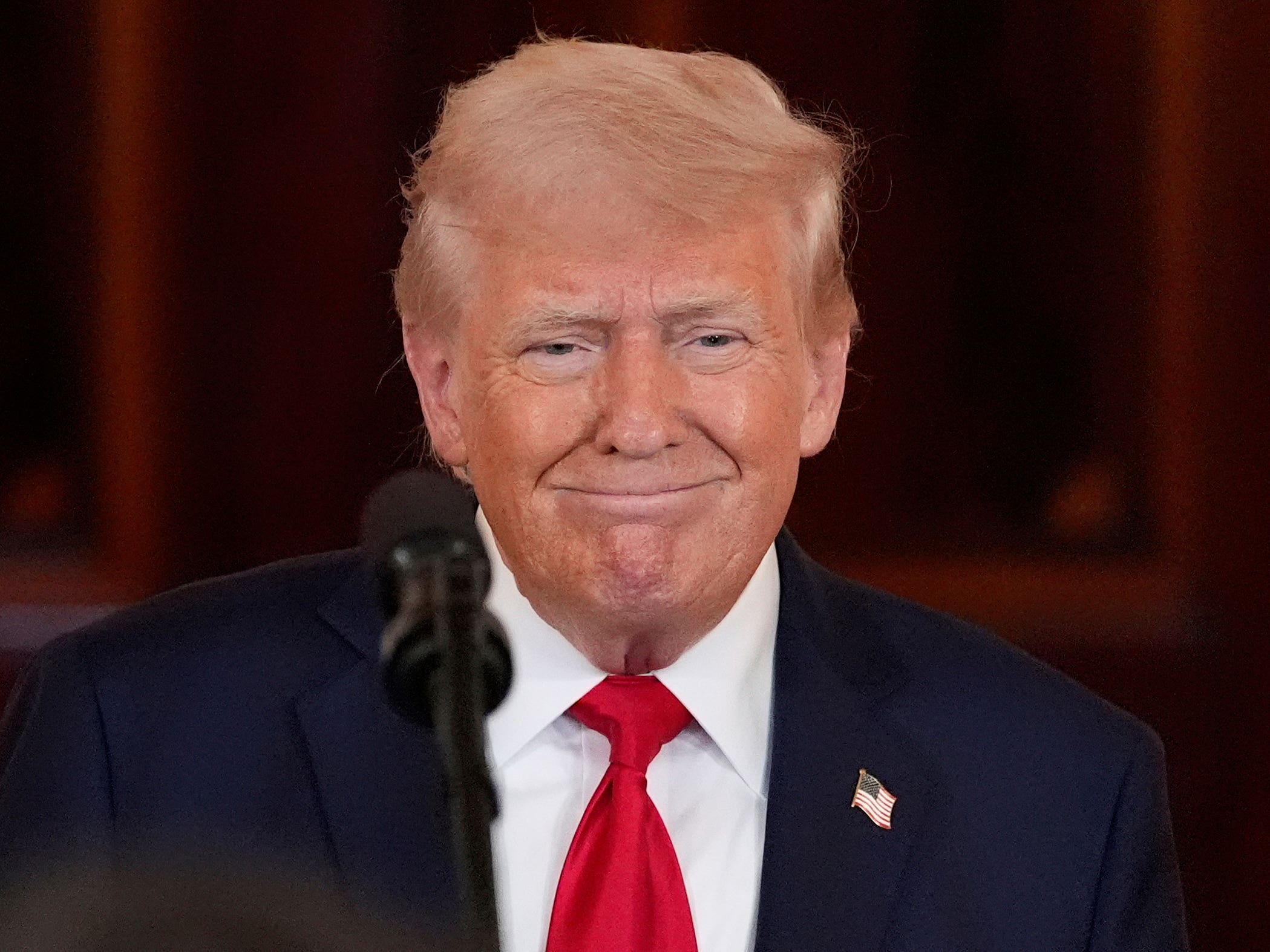 President Donald Trump speaks during an event about investing in America