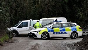 The scene in Oak Lane, Kingswinford as firefighters tackle a scrapyard fire.Police close the road off.