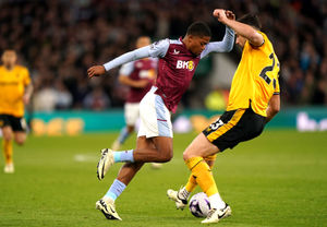 Aston Villa's Leon Bailey and Wolverhampton Wanderers' Max Kilman 