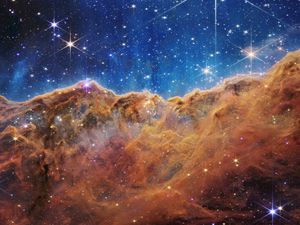 Supporting image for story: Group of galaxies and ‘baby stars’ among new images released by Nasa