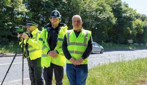 Police Officers from Wellington Safer Neighbourhood Team with Councillor Richard Overton, Deputy Leader and Cabinet Member for Highways, Housing & Enforcement with one of the devices on the A518.