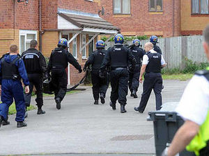 Supporting image for story: Heroin and crack cocaine seized in drug raid