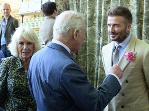 Supporting image for story: Charles sees rose named in his honour during Chelsea Flower Show tour