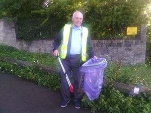 The Mayor of Dudley, Councillor David Stanley, helps collect rubbish at Cotwall End Nature Reserve