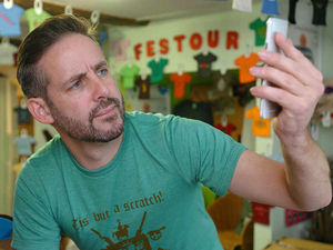 Supporting image for story: Festival shop relies on good signal for business