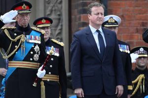 Prime Minister David Cameron watches the parade and the Duke of Kent takes the salute during Armed Forces Day at Cleethorpes, Lincolnshire