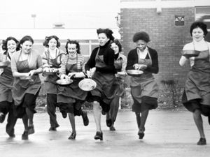 Supporting image for story: 'It's like patching a leaking boat: the state of our roads' - your letters, plus a 1978 snapshot of pancake racing at a Walsall school